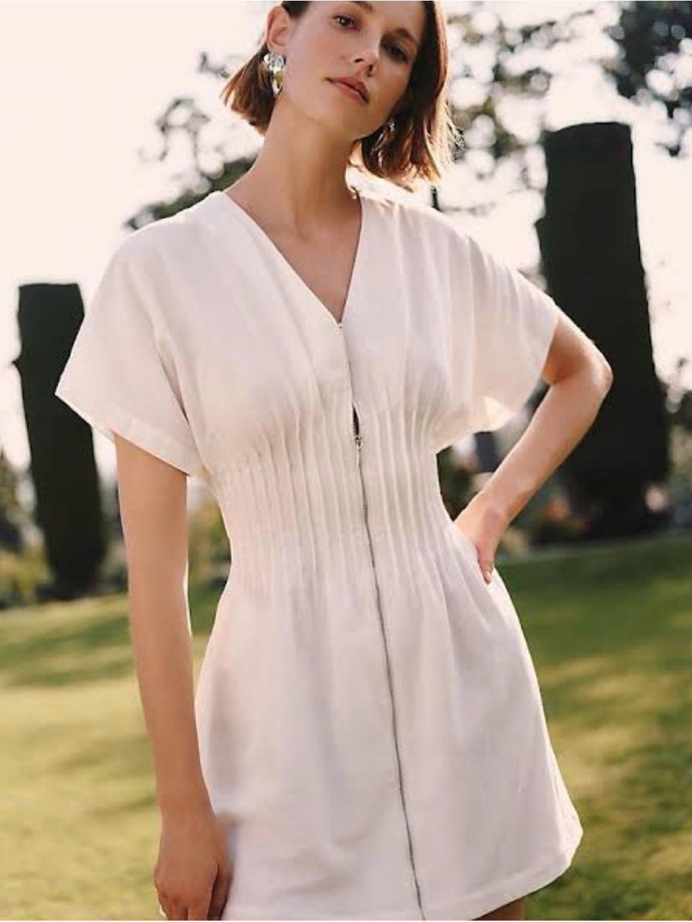 Exquisite white linen mini dress with zipper detail